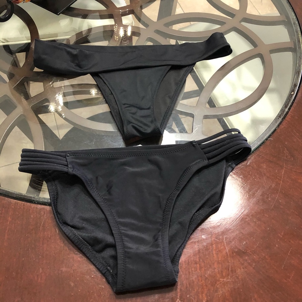 - Two black swimsuit bottoms for women
